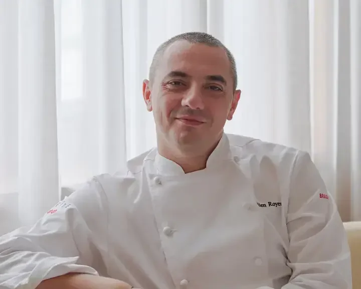 Chef Julien Royer seated at Odette.