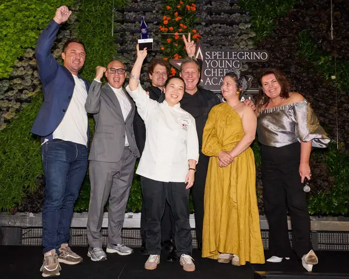 Kimberly Tang celebrating her win with the Pacific Local Jury.
