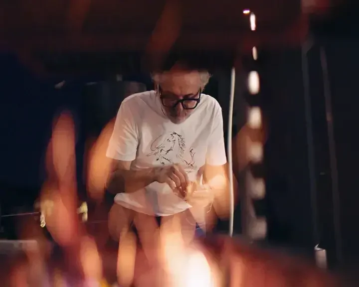 Chef Massimo Bottura in a white t-shirt.